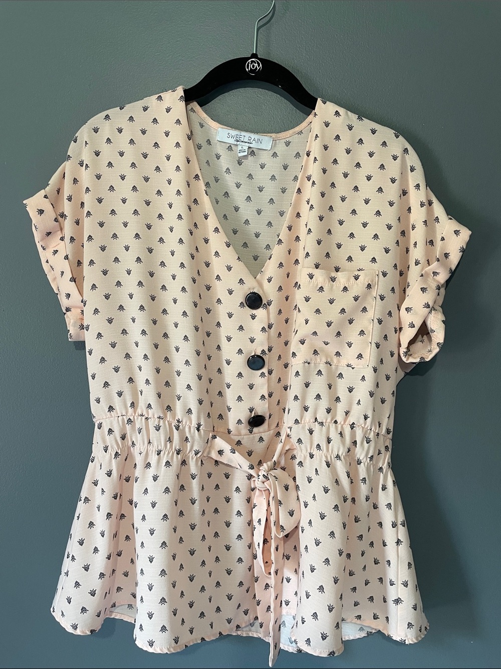 Peplum style v neck top